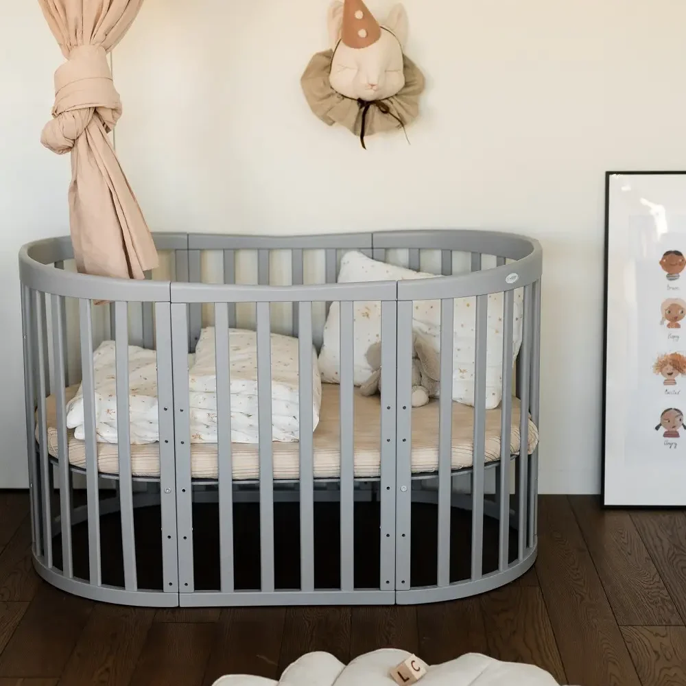 Ovális kiságy szürke színben